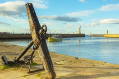 Old anchor by the jetties